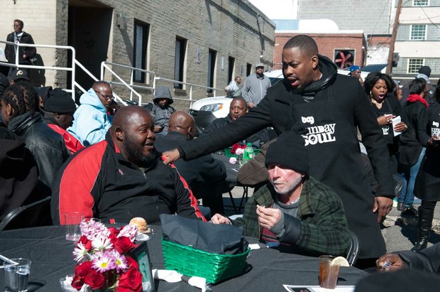 R&B artist and event co-sponsor Raheem DeVaughn, mingles with guests during the Sunday Soul DC Pop Up Event at the New York Avenue men's shelter, Sunday, April 3, 2016 in Northeast. /Photo by Patricia Little @5feet2