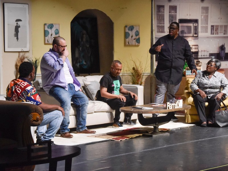 The cast of “Unforgettable” during an emotional moment when the family begins to suspect that the matriarch, Mama D (LeJeune Thompson), may be suffering from a form of dementia (DJ Corey Photography via Woolly Mammoth Theatre Company)