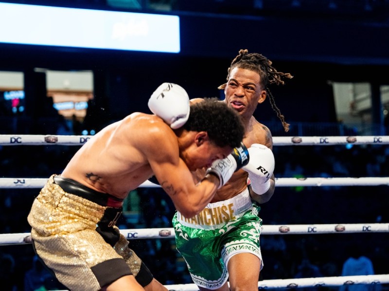 **FILE** Davis Boxing Promotions presents Strap Season on Saturday, Aug. 3, at the Entertainment and Sports Arena in Southeast D.C., featuring Frankie "Franchise" Scarboro, who is landing a punch against his opponent Jose Rodriguez Crespo in May. (Abdullah Konte/The Washington Informer)