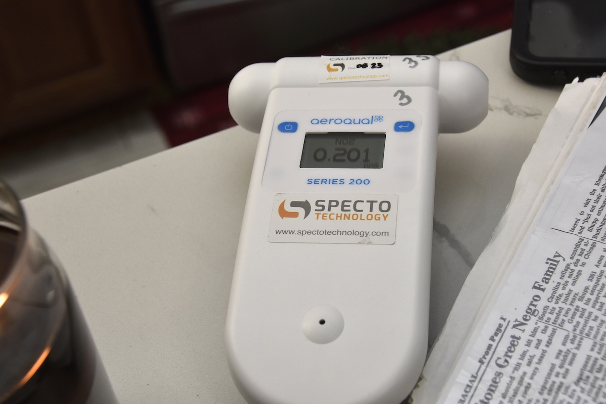 **FILE** An air quality test is conducted inside a kitchen in Northeast D.C. in 2022, while the gas stove was turned on to determine gas leaks that affect asthma and other respiratory ailments in housing. The Chesapeake Climate Action Network condemned Washington Gas in a statement on Aug. 27, for failing to fix cancer-causing gas leaks that have affected people and their animals. (Robert R. Roberts/The Washington Informer)
