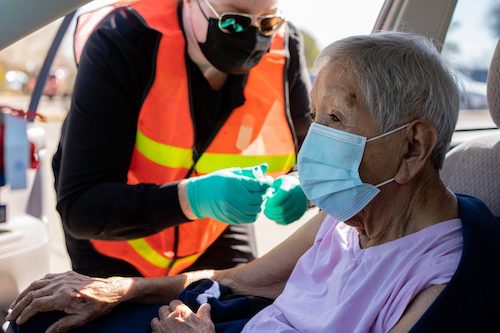 Army veteran Dolores Rivera receives her first Moderna COVID-19 vaccine at a mobile clinic in Hobbs, New Mexico, on March 19, 2021. (VA photo by Reynaldo Leal)