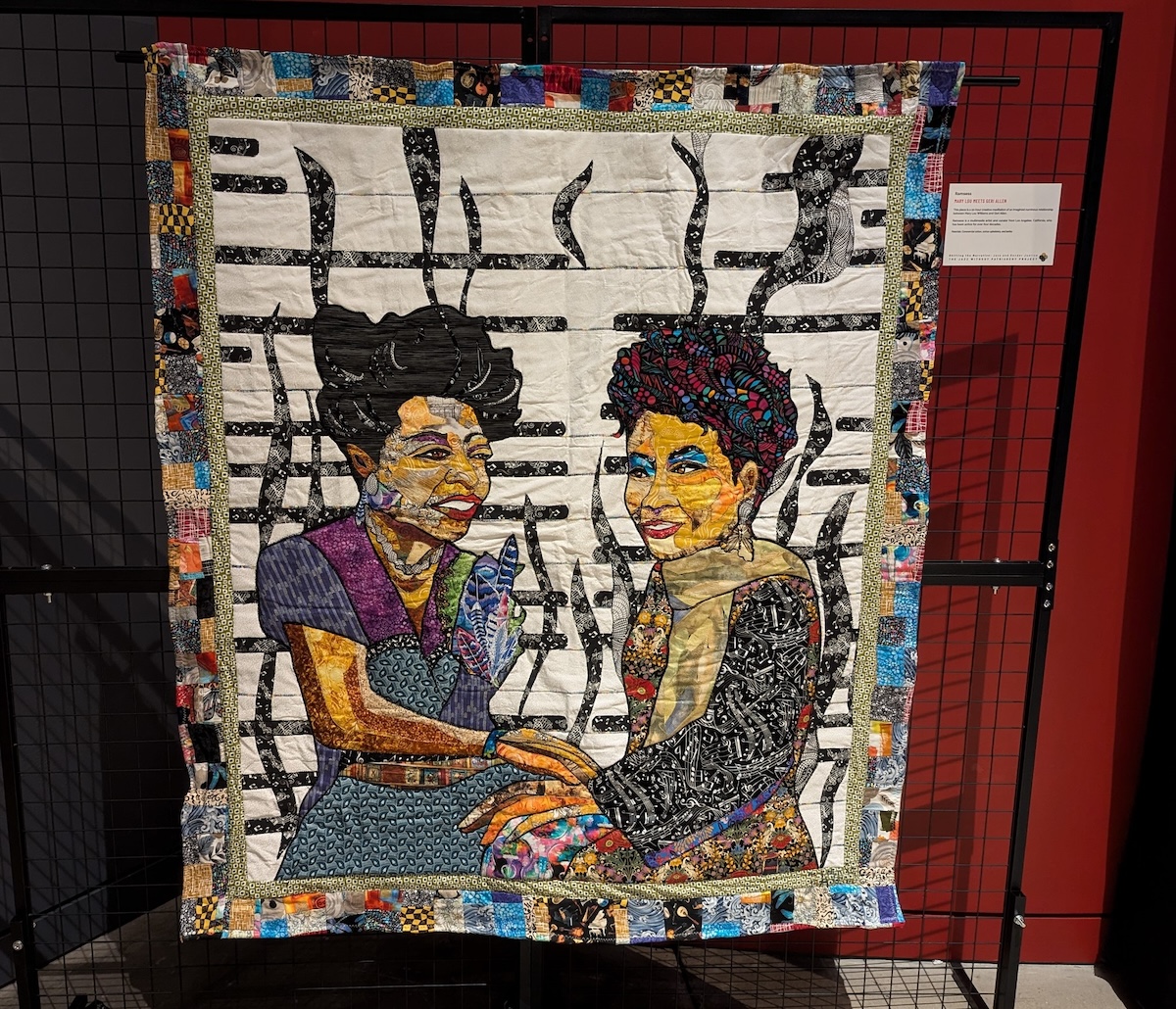 One of the first seen upon entering “New Standards: Shifting The Narrative” is a quilt titled “Mary Lou Meets Geri Allen” by the artist Ramsess. The quilt honors Mary Lou Williams and Allen, both pianists and composers. (Brenda C. Siler/The Washington Informer)