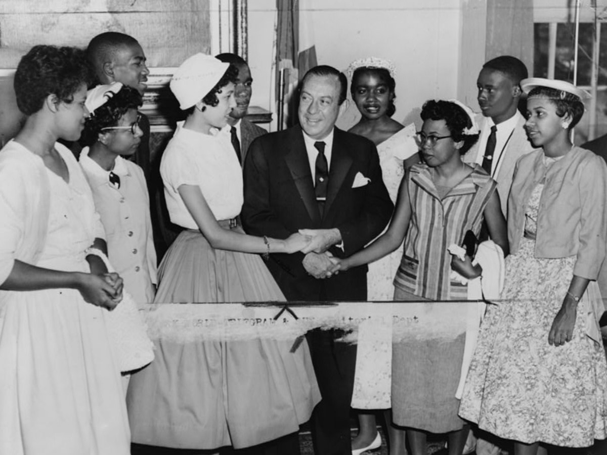 New York City Mayor Robert Wagner greets the teenagers who integrated Central High School in Little Rock, Arkansas. (World Telegram photo by Walter Albertin via Library of Congress)