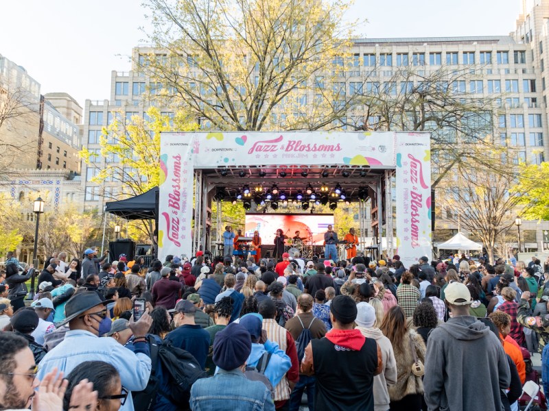 A crowd jams as Digable Planets performs at the Jazz and Blossoms festival at Franklin Square Park on April 7. (Ja’Mon Jackson/The Washington Informer)