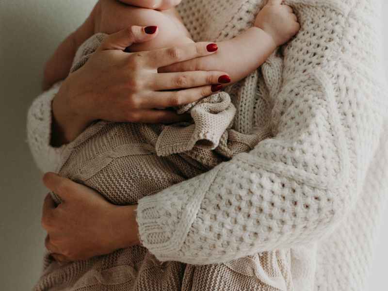 mother holding her baby