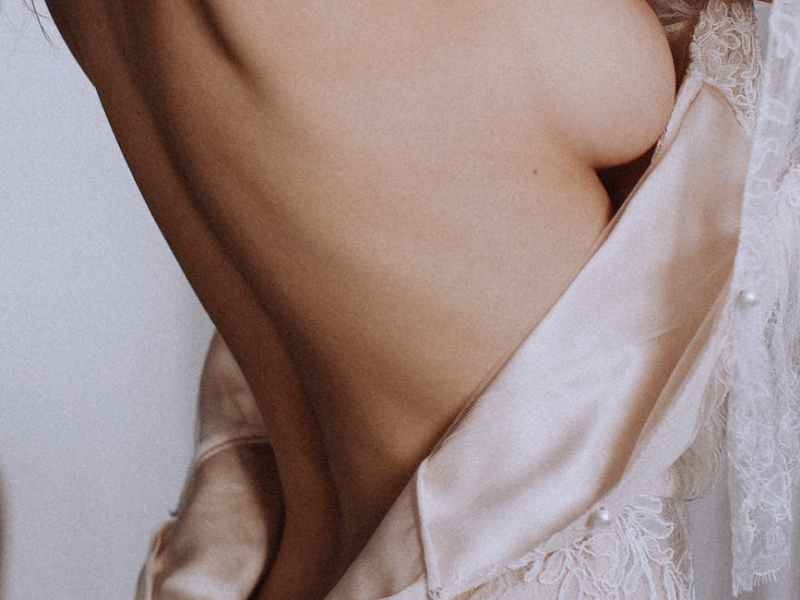 a woman undressing